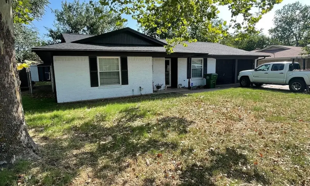 Professional roofing crew working on a residential roof in Boiling Springs